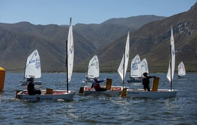 Optimists on the water during the 2025 Youth Nationals