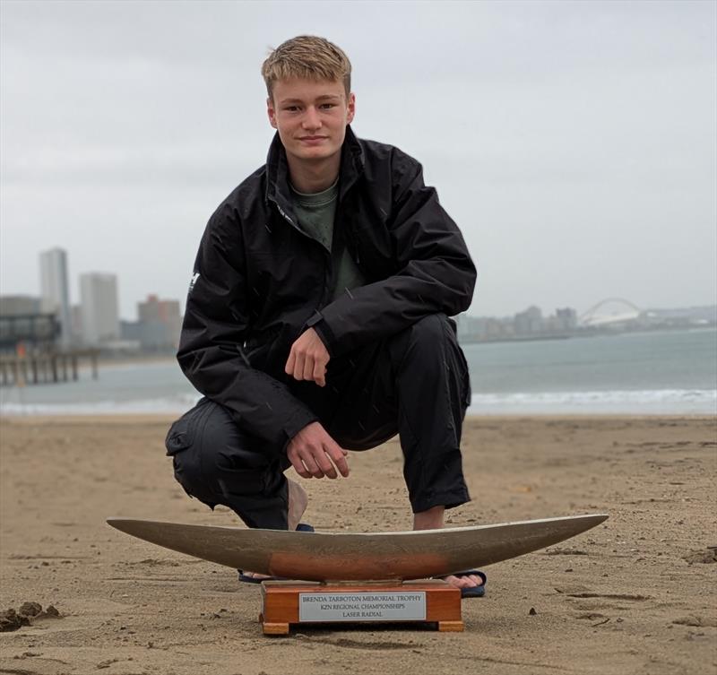 Blake Madel with the Brenda Tarboton Memorial Trophy